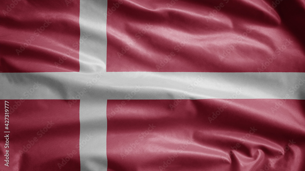 Danish flag waving in the wind. Close up of Denmark banner blowing soft silk. Danish flag waving in the wind. Close up of Denmark banner blowing soft silk.