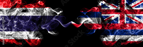 Thailand, Thai vs United States of America, America, US, USA, American, Hawaii, Hawaiian smoky mystic flags placed side by side. Thick colored silky abstract smokes flags. photo
