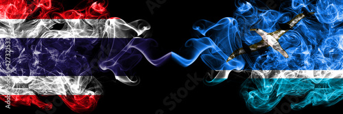 Thailand, Thai vs United States of America, America, US, USA, American, Midway Islands smoky mystic flags placed side by side. Thick colored silky abstract smokes flags.