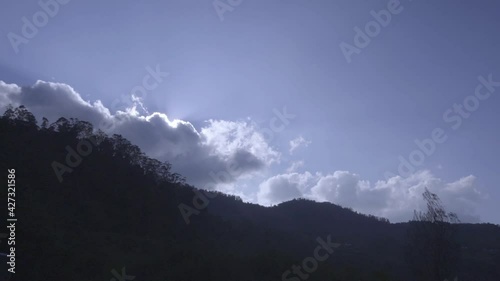 time lapse of clouds over mountains