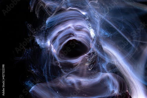 lightpainting portrait, new art direction, long exposure photo without photoshop, light drawing at long exposure