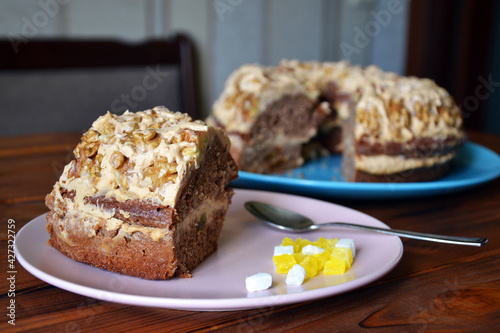 Homemade cake with walnuts and custard