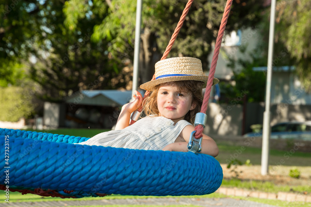 Beautiful little girl in a straw hat Beautiful little girl in a straw hat