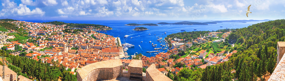 Coastal summer landscape, panorama from the fortress - top view of the town of Hvar, on the island of Hvar, the Adriatic coast of Croatia