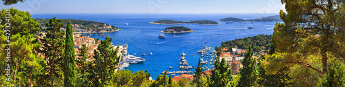 Coastal summer landscape, panorama - top view of the City Harbour of the town of Hvar and Paklinski Islands, the island of Hvar, the Adriatic coast of Croatia