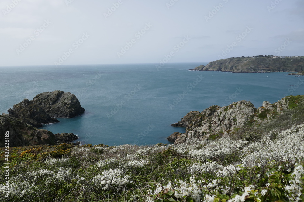 Rocky headland on coast of Guernsey