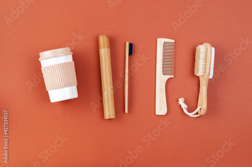 Personal hygiene accessories from bamboo and wooden material. Zero waste kit flat lay  reusable mug for takeaway  sustainable style of life. Plastic free  eco friendly concept