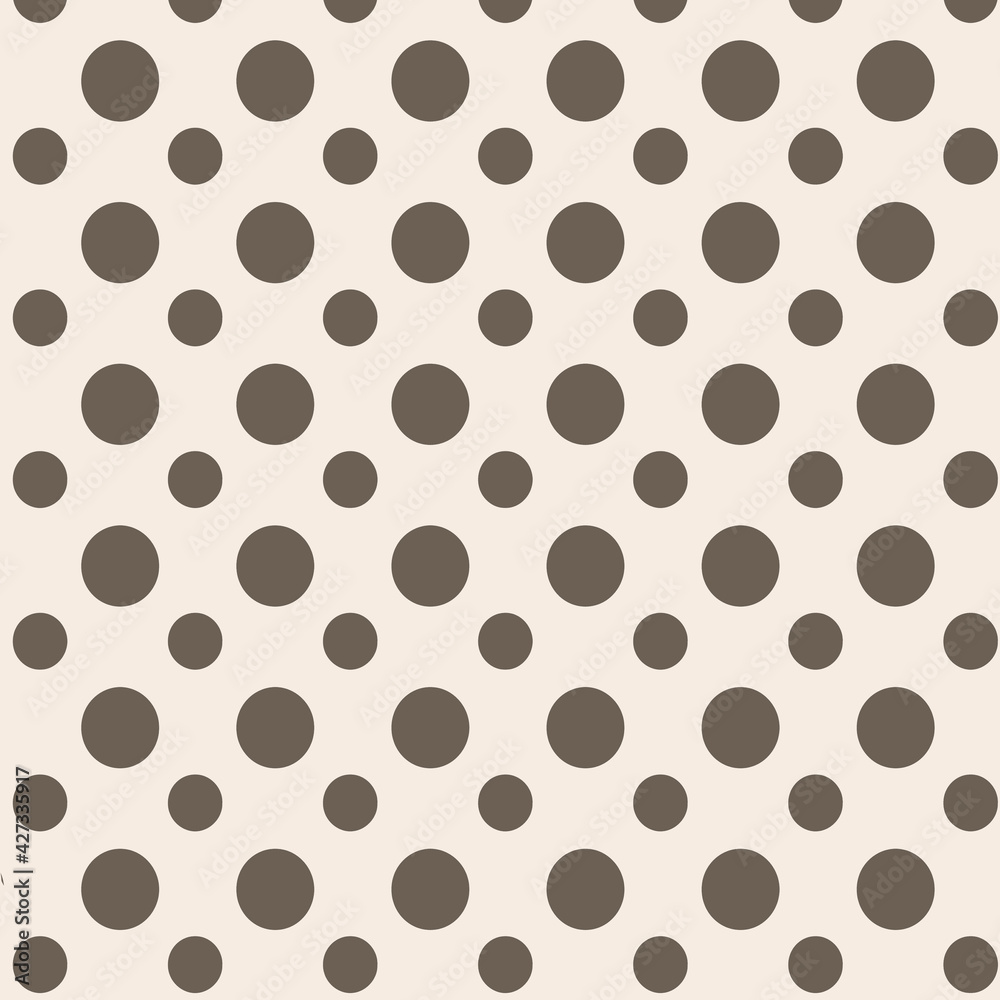 Polka dotted pattern pale yellow and brown with various sized circles for backgrounds and design elements. Polka dotted pattern pale yellow and brown with various sized circles for backgrounds and design elements.