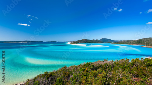 Hill Inlet at Whitsunday Island - swirling white sands, sail boats and blue green water make spectacular patterns on a beautiful clear blue sky day © Andrew Atkinson