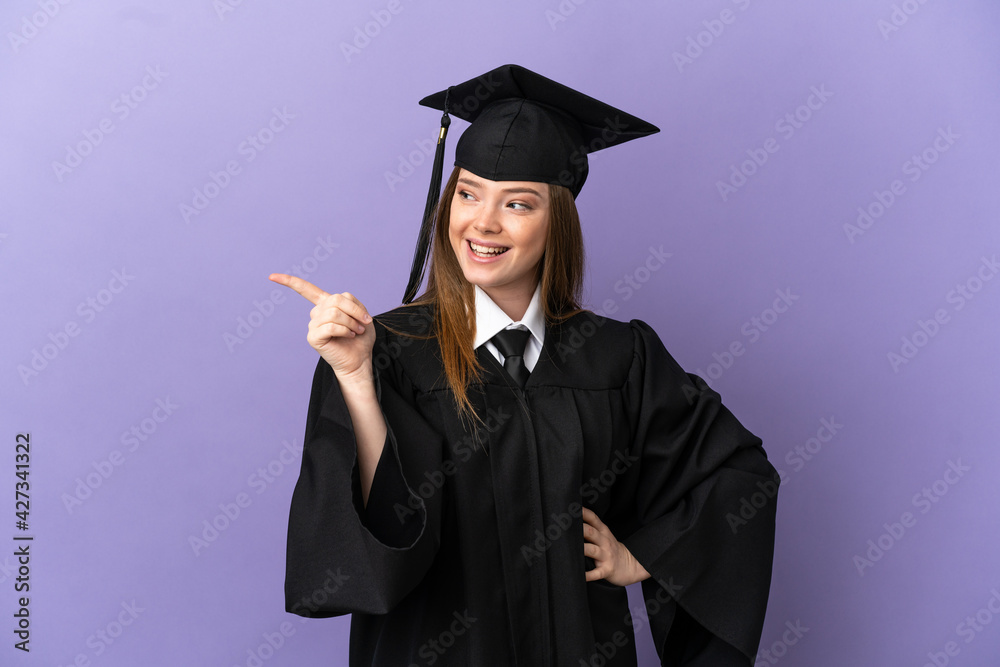 Young university graduate over isolated purple background intending to realizes the solution while lifting a finger up Young university graduate over isolated purple background intending to realizes the solution while lifting a finger up