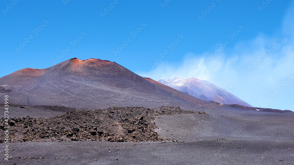 Mount Etna in Sicily near Catania, Tallest active volcano in Italy and whole Europe. Traces of volcanic activity, steam from craters.