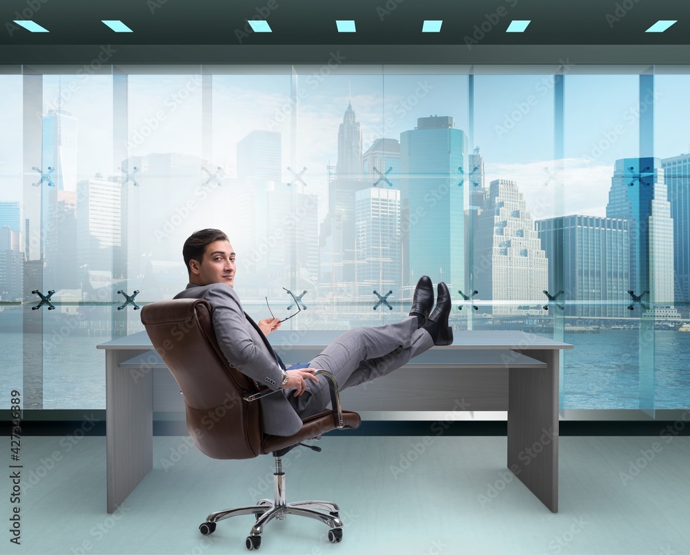 Fototapeta premium Young male businessman enjoying his time during vacation