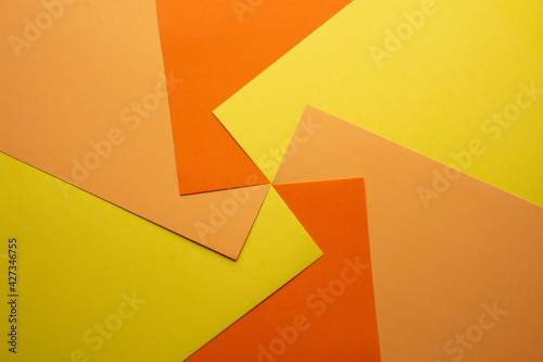 Colored papers in an abstract background 