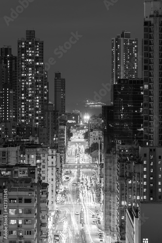 Night scenery of busy street in downtown district of Hong Kong city © leeyiutung