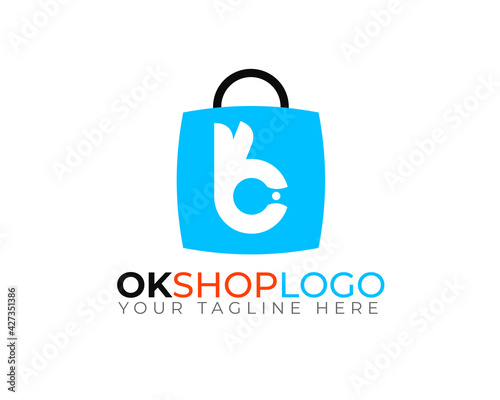 ok shop logo with hand sign on the bag