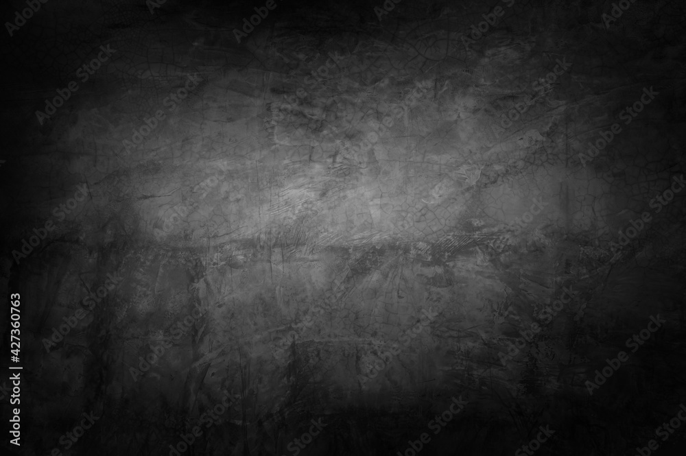Empty old black cement wall texture backgrounds.