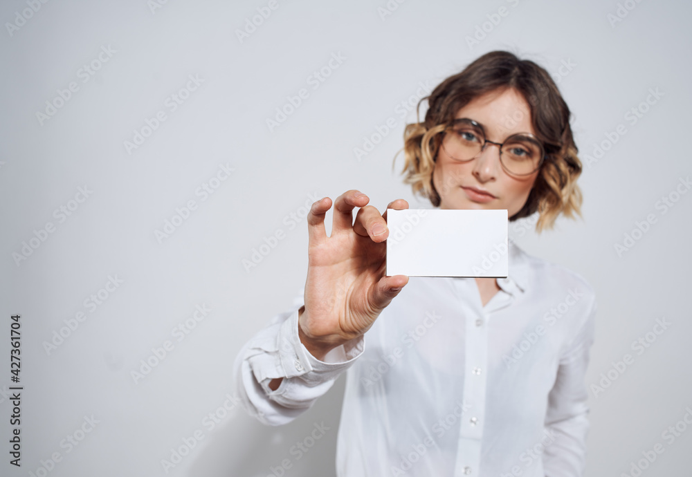 Business woman in shirt with business card in hand mockup Business woman in shirt with business card in hand mockup