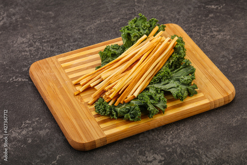 Chechel cheese sticks over board photo