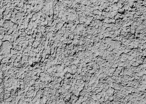 Bumpy cement wall texture background photo