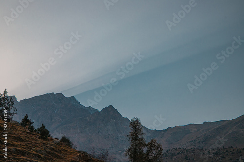 sun rays over the mountains