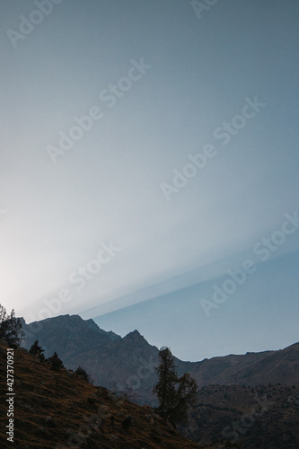 sun rays over the mountains