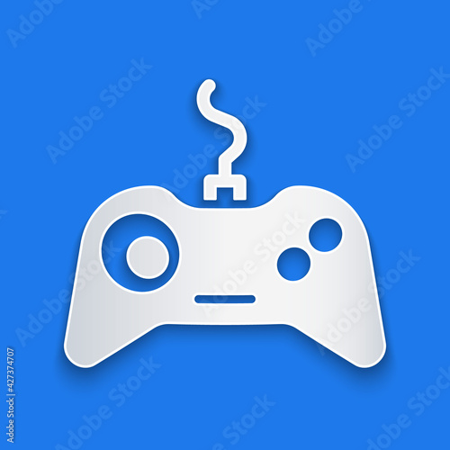 Paper cut Gamepad icon isolated on blue background. Game controller. Paper art style. Vector Illustration