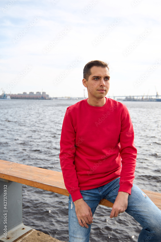 man sitting on the pier