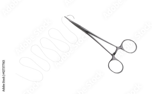 Forceps with suture thread on white background, top view. Medical equipment © New Africa
