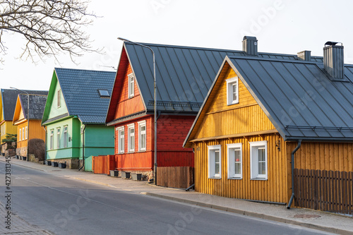  Old Lithuanian traditional green wooden houses with three windows in Trakai, Vilnius, Lithuania  photo