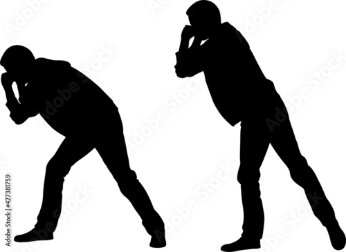 silhouettes of people pulling something heavy