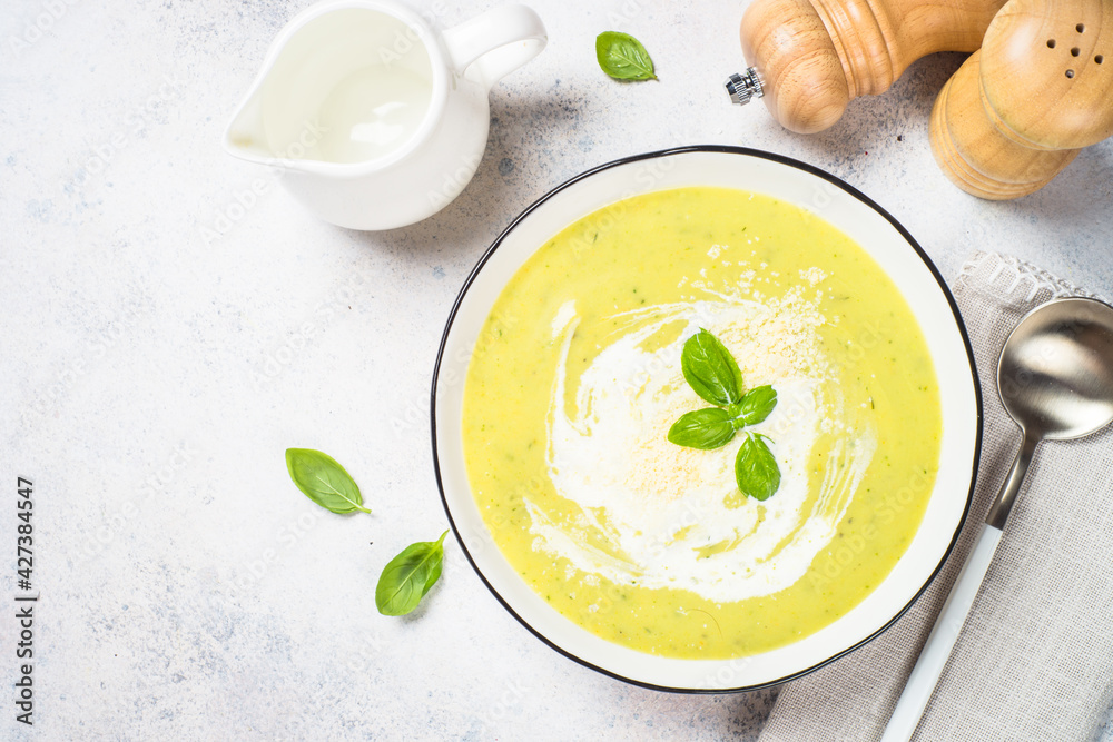 Zucchini soup with spinach and herbs at white. Zucchini soup with spinach and herbs at white.