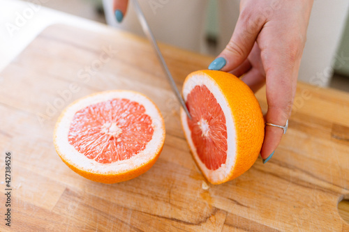 slicing a grapefruit
