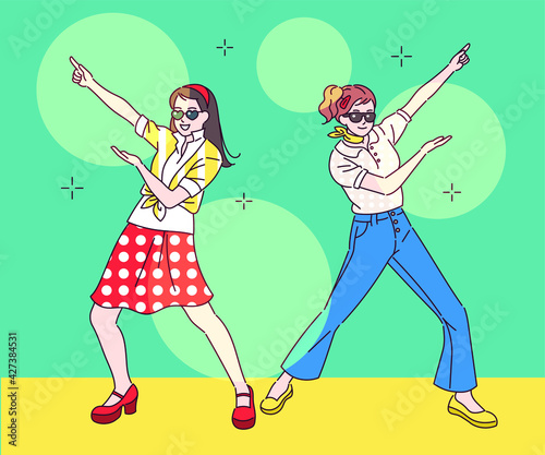 Two women in funny style are dancing disco. hand drawn style vector design illustrations. 