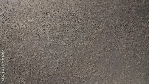 gray background in the form of a plastered wall