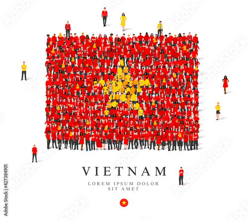 A large group of people are standing in red and yellow robes, symbolizing the flag of Vietnam.