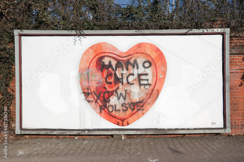 An anti-abortion poster with an inscription made with a spray, 