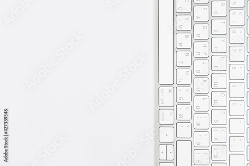 Aluminum computer keyboard wireless connection. Beautiful modern design, isolated on white background.