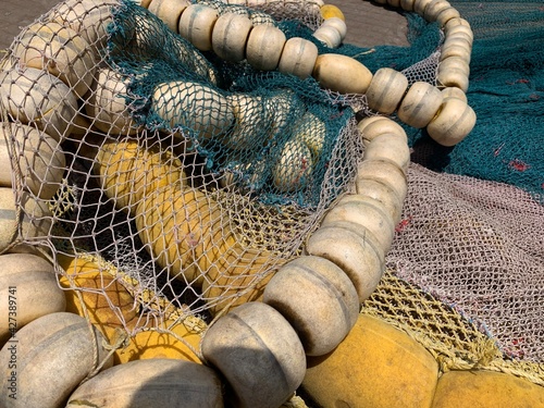 background of colorful fishing nets and floats.
