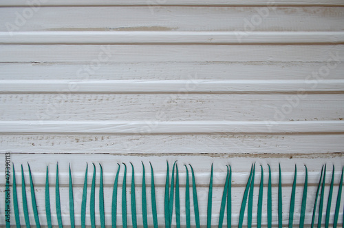 wood ruffled background with paper grass