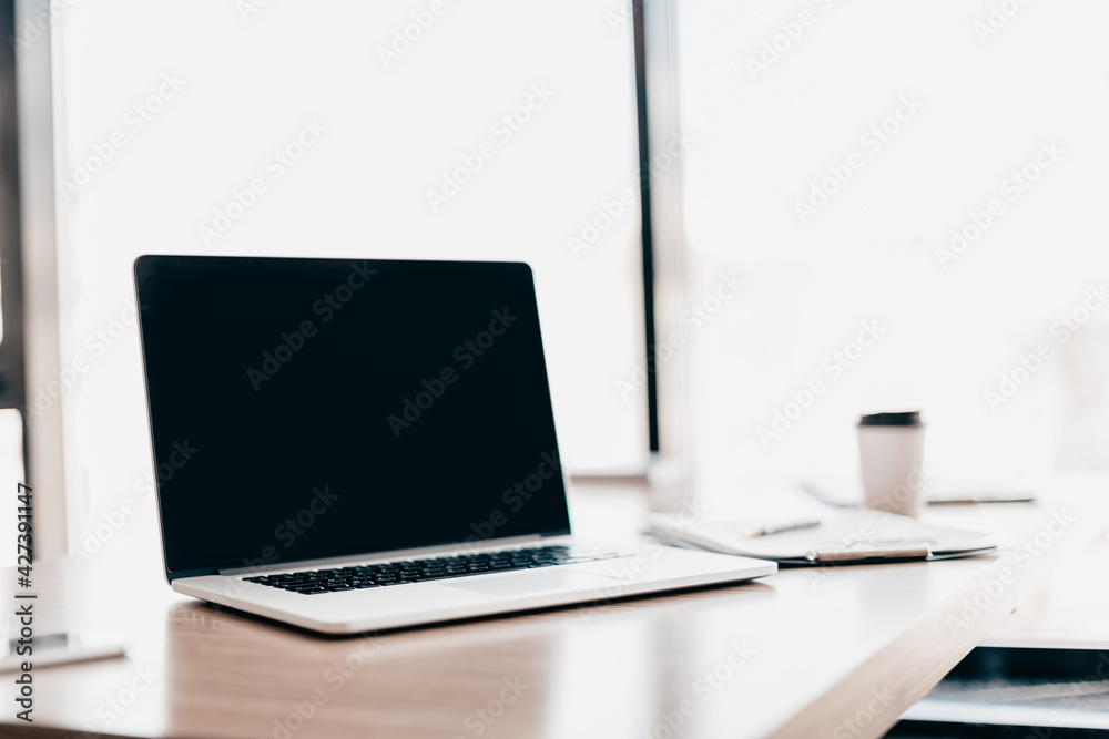 close up. open laptop on the office Desk. close up. open laptop on the office Desk.