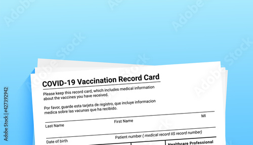 Coronavirus vaccination record card on blue background with copy space for travel and movement without borders. Vaccination form during the coronavirus covid 19 epidemic