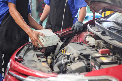 Maintenance car repair automotive worker.