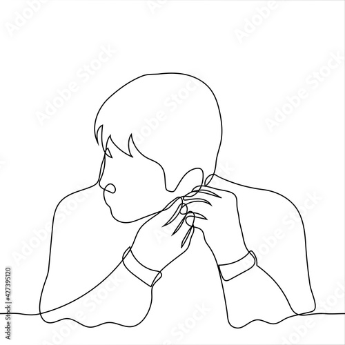 man puts an earring on herself - one line drawing vector. the concept of getting ready for a meeting or a date, trying on an earring when buying bijouterie or jewelry indications