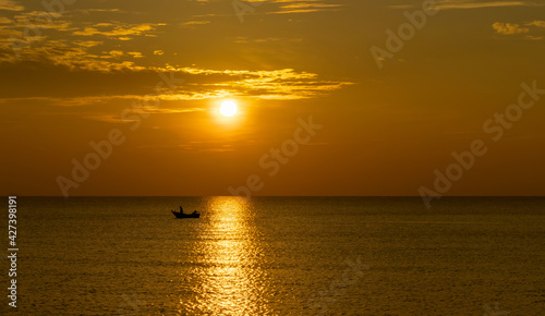 boat in the sea in the morning, sunrise © suththirat