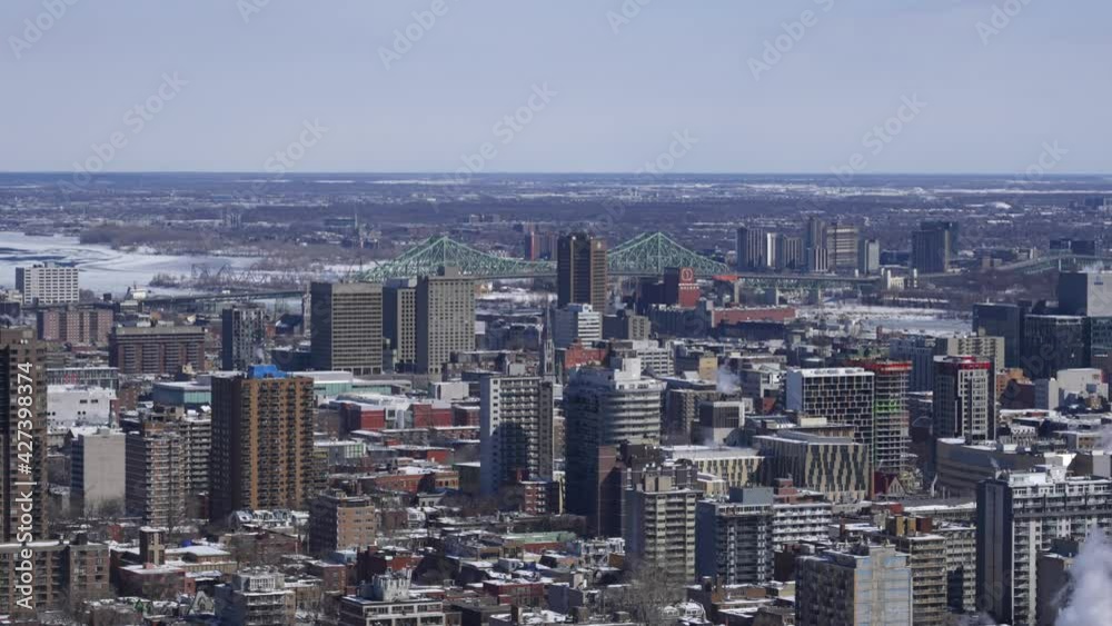 Wide Shot of Montreal Urban City Buildings with Jacques Cartier Bridge in Background Wide Shot of Montreal Urban City Buildings with Jacques Cartier Bridge in Background