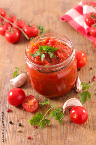 tomato sauce and spices in jar