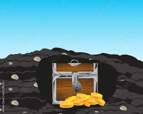 Coffer with golden coin hidden in ground