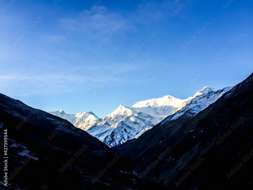 Mountains silhouette on the blue sky background