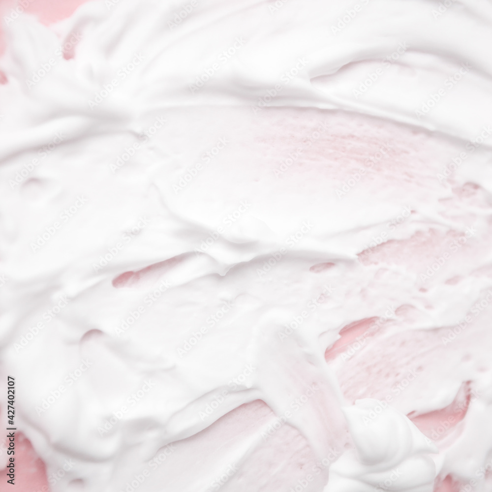 White cosmetic foam texture on pink on pink background. Cosmetic mousse, cleanser, shaving foam, shampoo. Foamy skin care product, skincare, male hygiene concept, copy space White cosmetic foam texture on pink on pink background. Cosmetic mousse, cleanser, shaving foam, shampoo. Foamy skin care product, skincare, male hygiene concept, copy space
