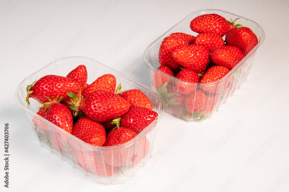 Punnet of strawberries isolated on white background, High quality photo Punnet of strawberries isolated on white background, High quality photo